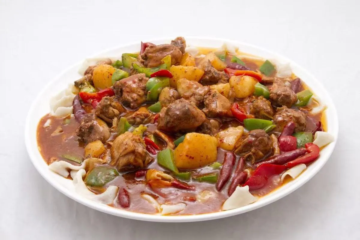 Uyghur lamb and vegetable stew with noodles at Bogda Uyghur Restaurant, a Central Asian Halal Restaurant in Plano